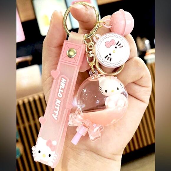 XMAS SALE Hello Kitty Baby Pink Liquid Lollipop Bag Charm Keychain - Picture 1 of 4